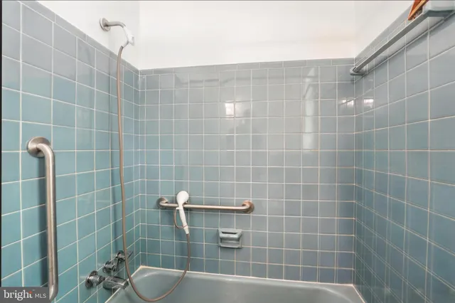 a front view of a house with a yard table and chairs