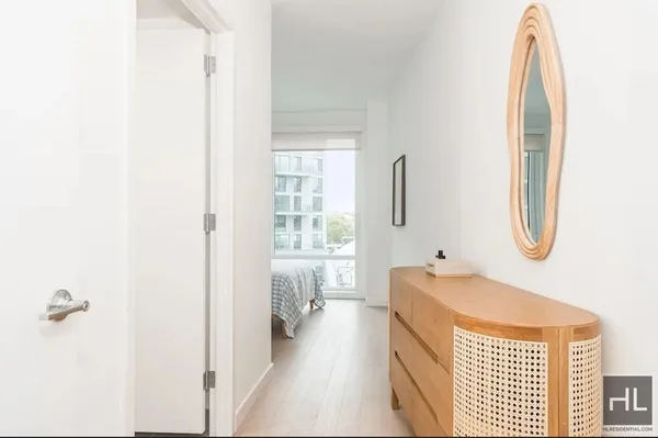 a en suite bathroom with a sink and a mirror
