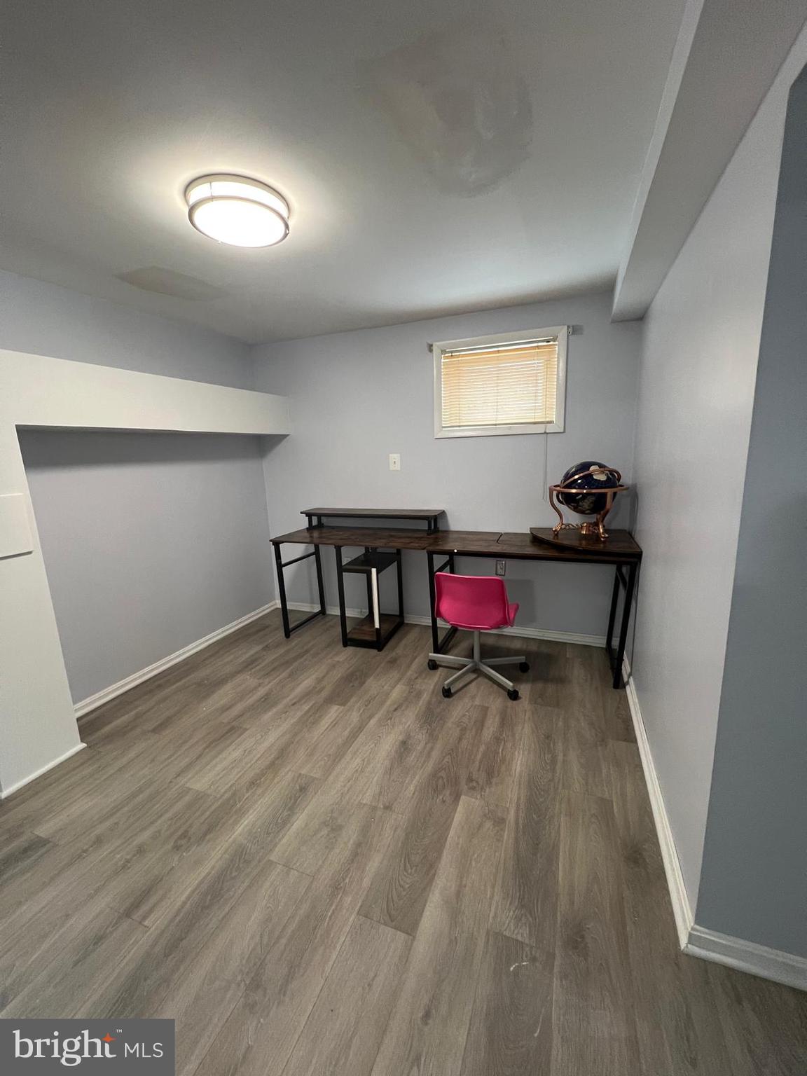513 Creek Crossing Road Northeast Vienna, VA 22180 - Photo 11 of 15 a living room with furniture and a wooden floor
