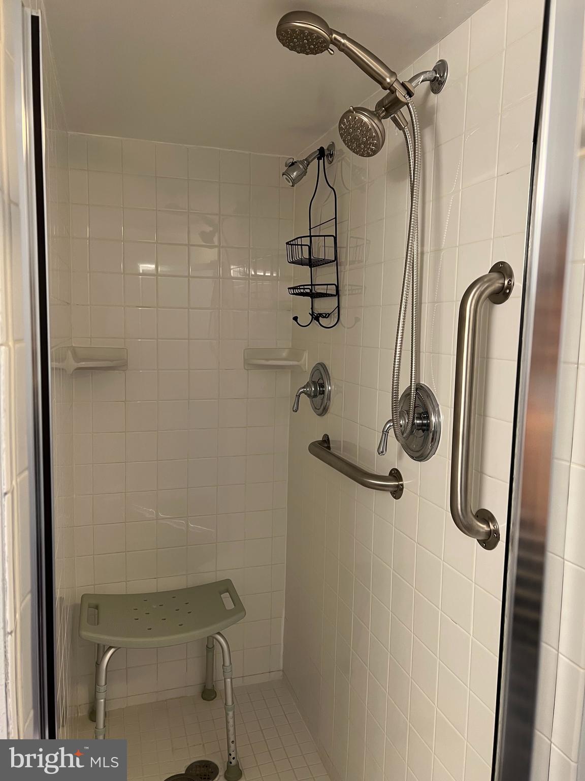 513 Creek Crossing Road Northeast Vienna, VA 22180 - Photo 6 of 15 a bathroom with a shower