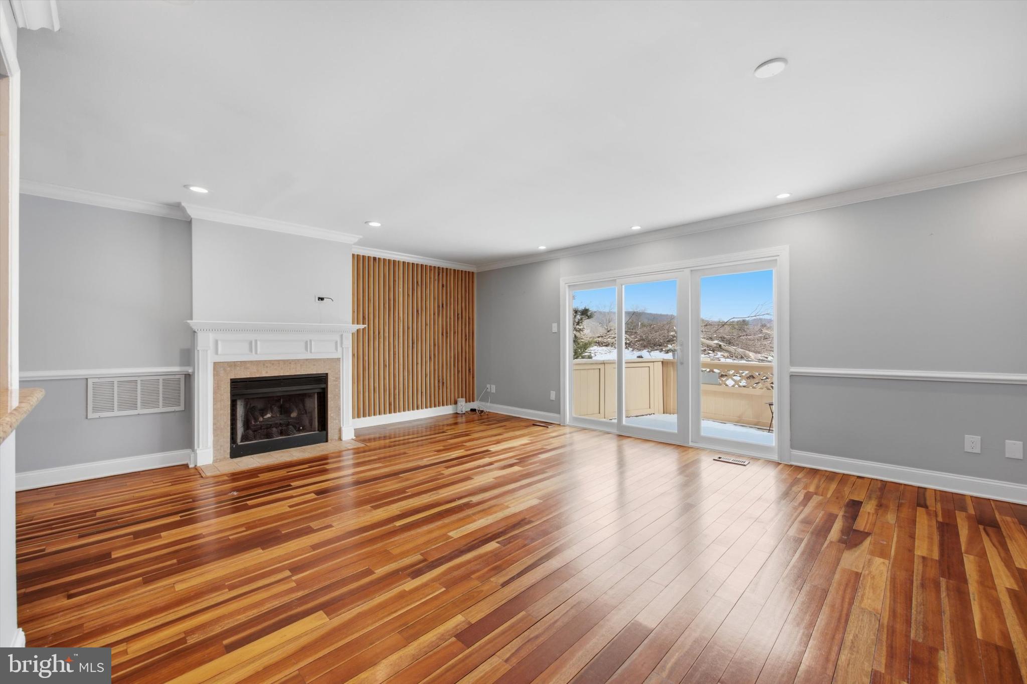 46 Main Street Chesterbrook, PA 19087 - Photo 12 of 44 a view of a kitchen with wooden floor and a fireplace