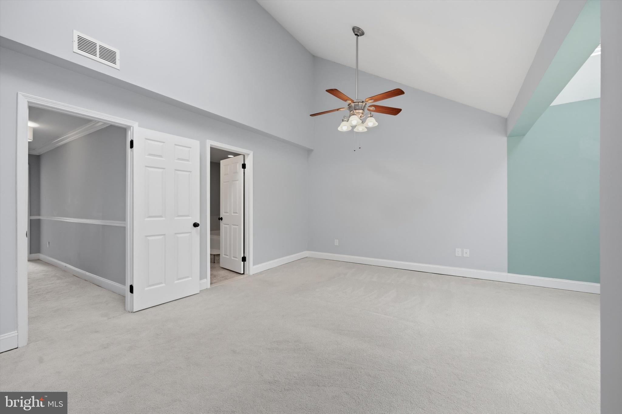 46 Main Street Chesterbrook, PA 19087 - Photo 20 of 44 an empty room with closet and a chandelier fan