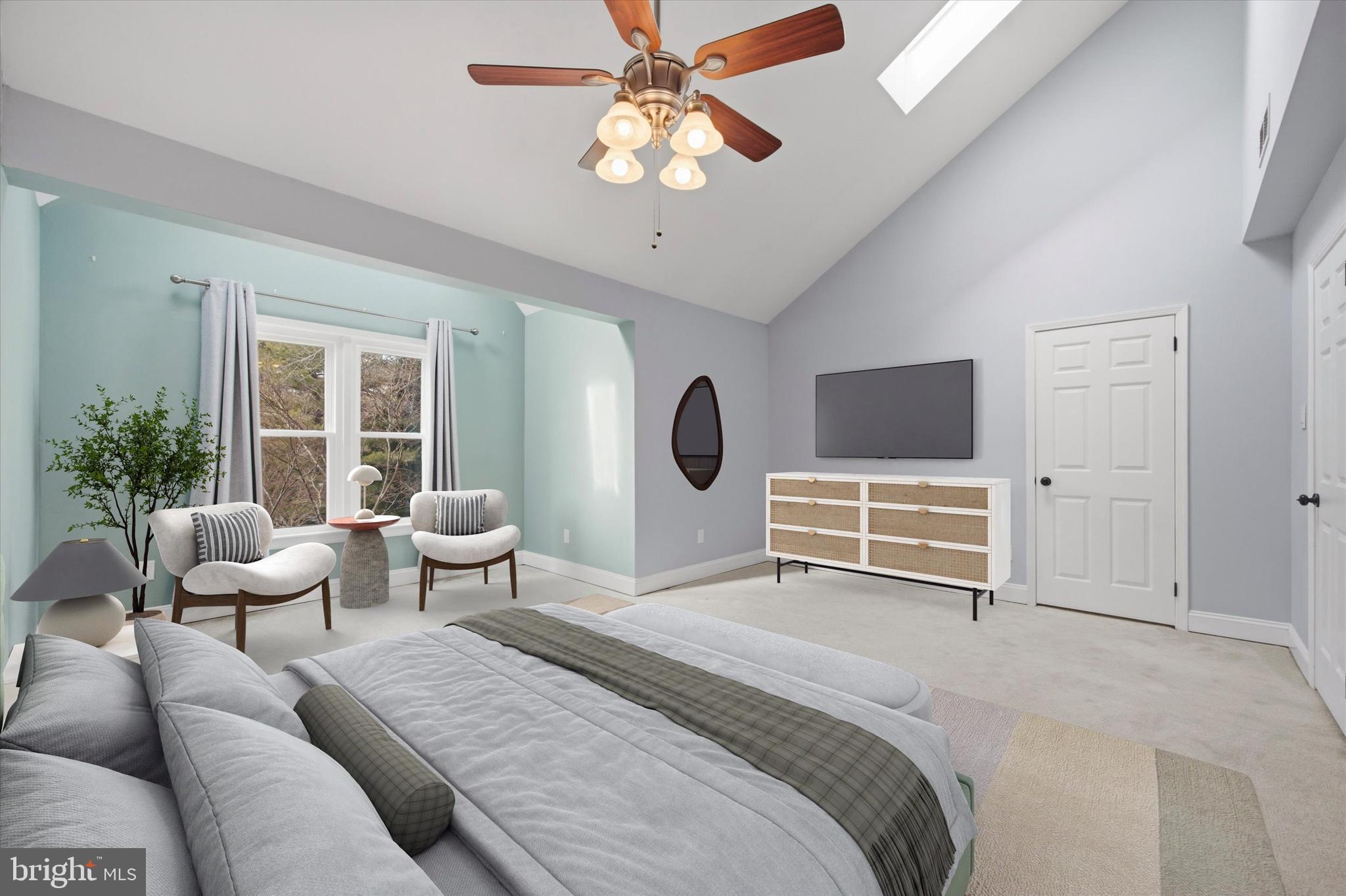46 Main Street Chesterbrook, PA 19087 - Photo 21 of 44 a spacious bedroom with a bed and a chandelier