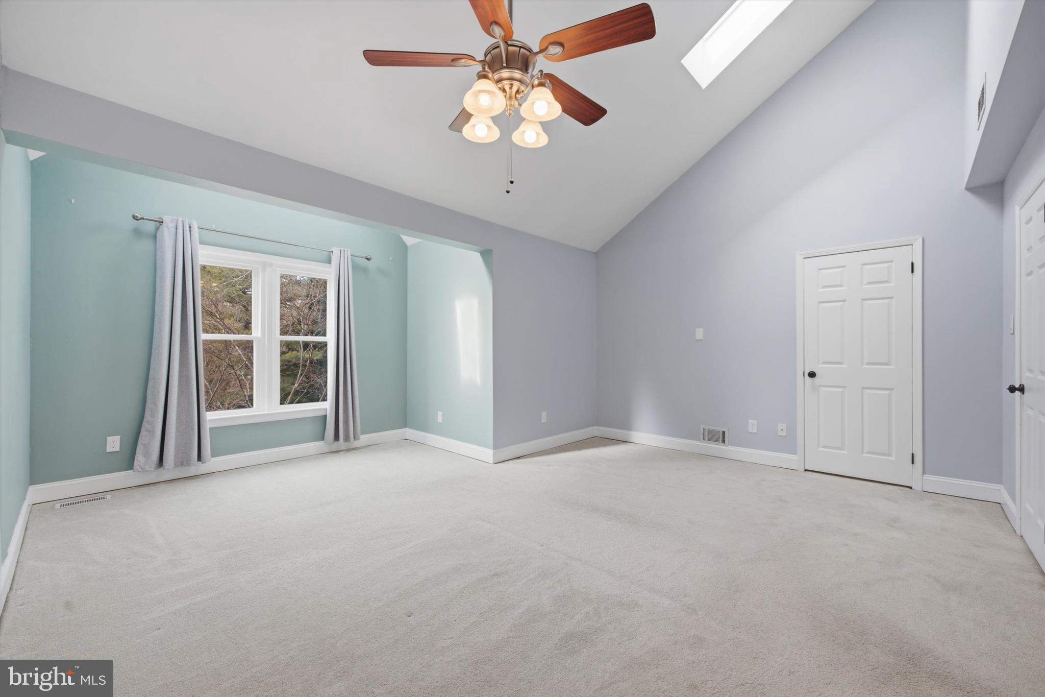 46 Main Street Chesterbrook, PA 19087 - Photo 22 of 44 a view of an empty room with window and a ceiling fan