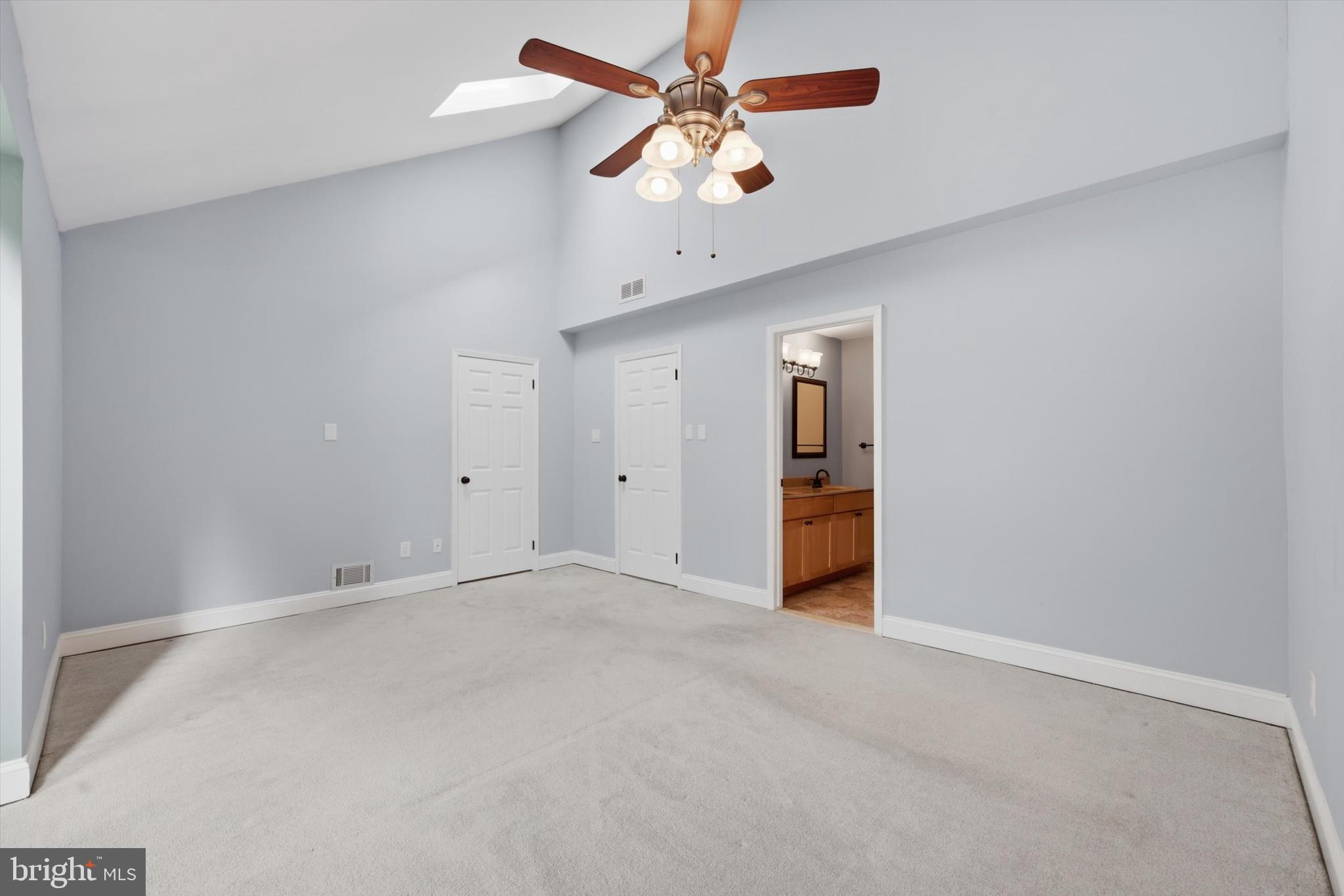 46 Main Street Chesterbrook, PA 19087 - Photo 23 of 44 an empty room with fan and windows