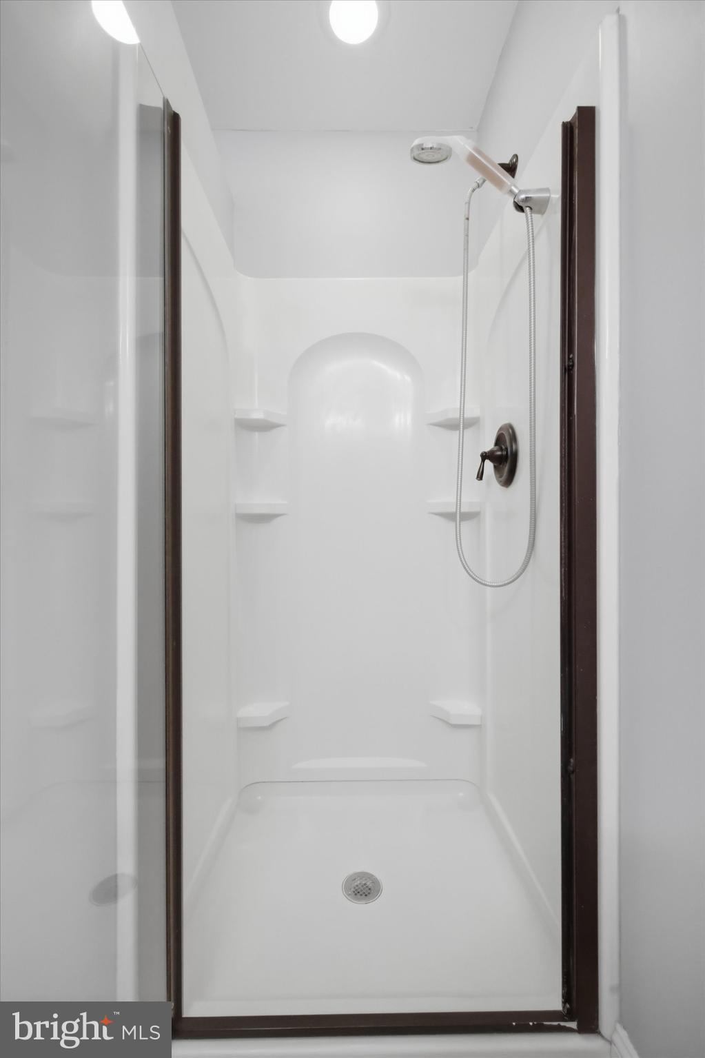 46 Main Street Chesterbrook, PA 19087 - Photo 26 of 44 a bathroom with a shower