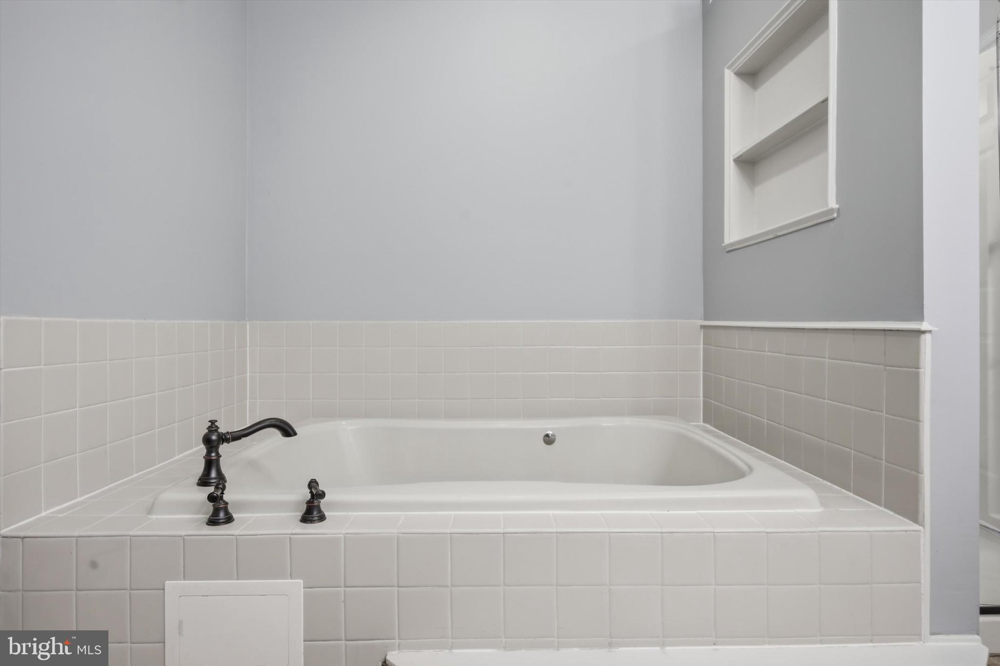 46 Main Street Chesterbrook, PA 19087 - Photo 27 of 44 a bathroom with bathtub