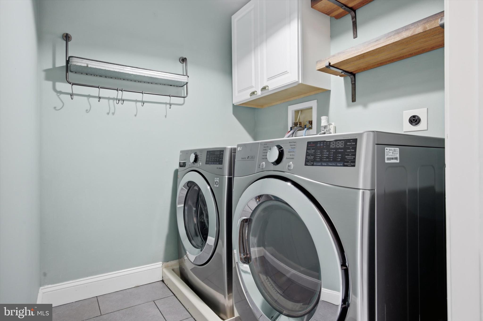 46 Main Street Chesterbrook, PA 19087 - Photo 29 of 44 a utility room with dryer and washer
