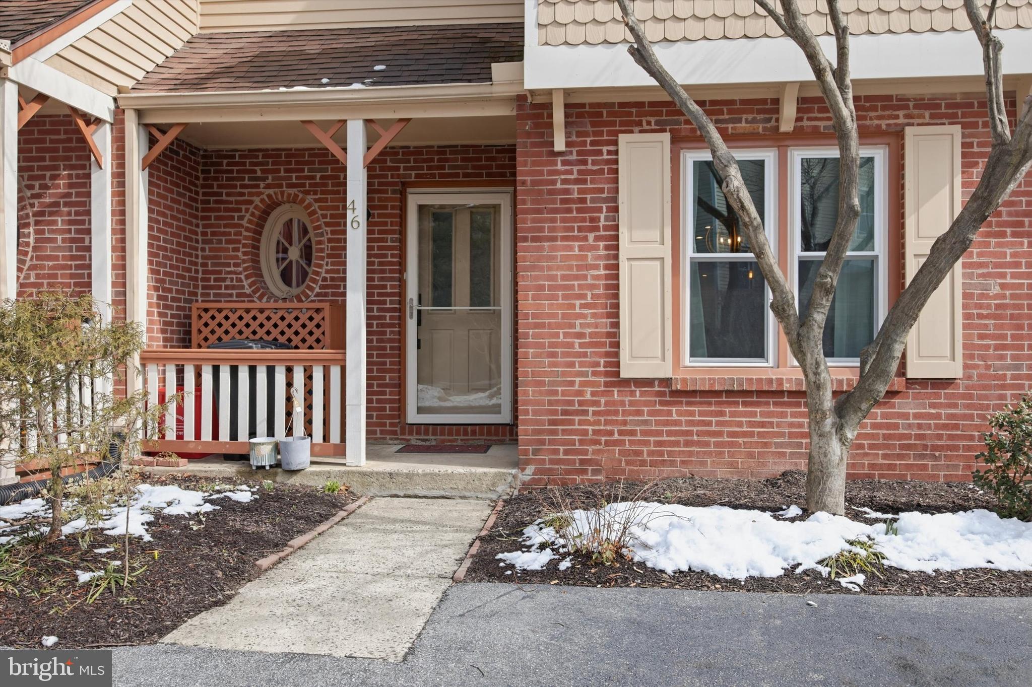 46 Main Street Chesterbrook, PA 19087 - Photo 3 of 44 a front view of a house with a garage