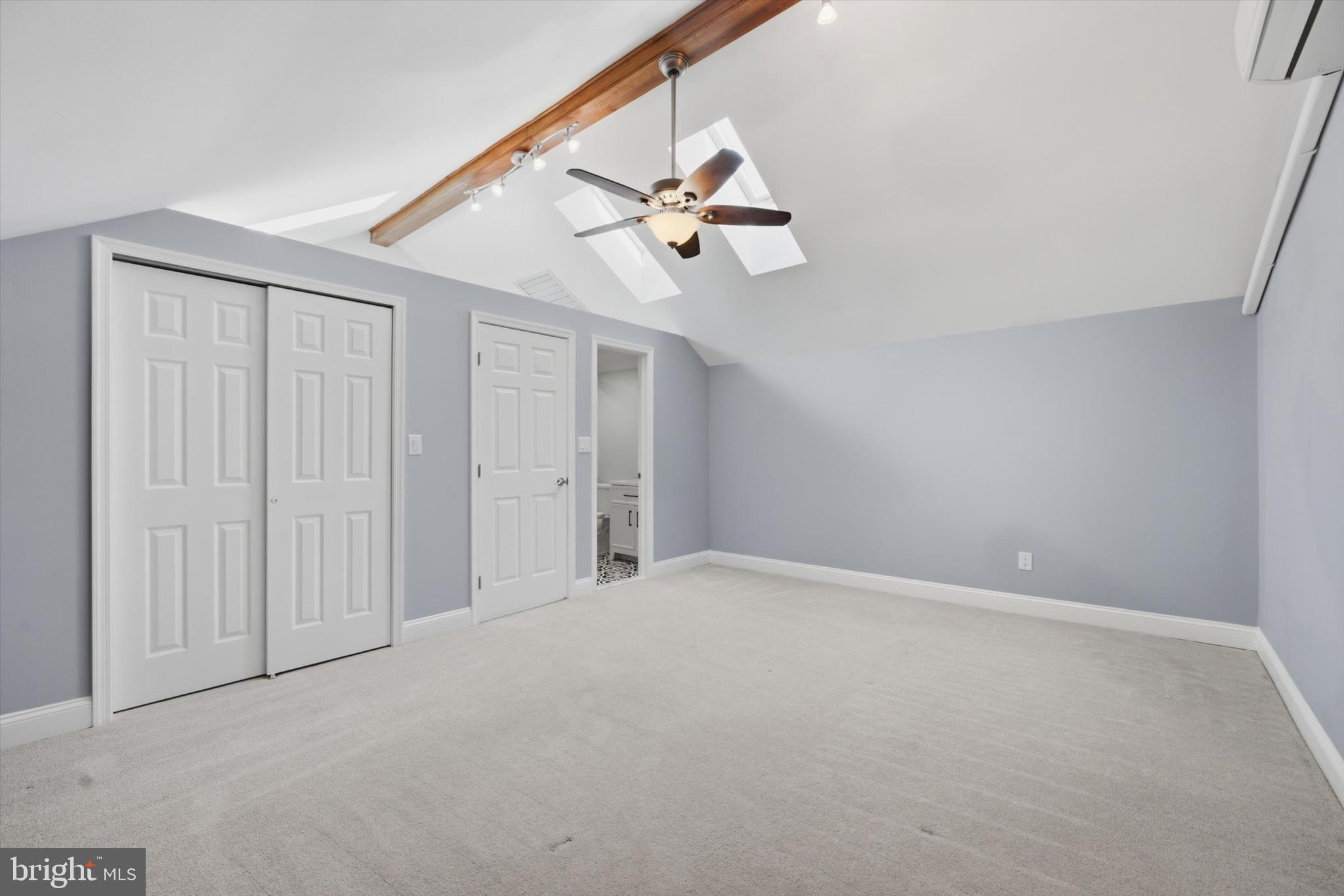 46 Main Street Chesterbrook, PA 19087 - Photo 34 of 44 an empty room with windows and fan