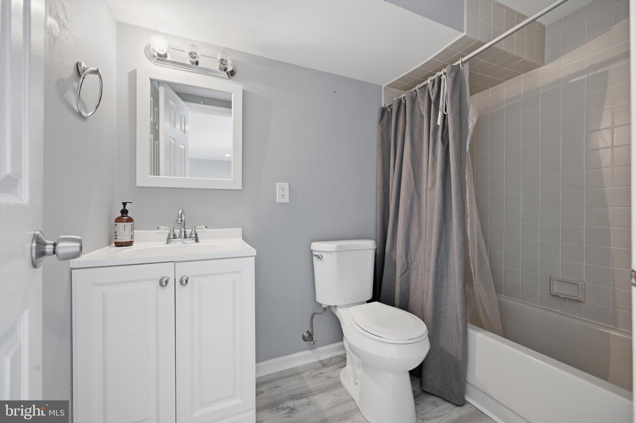 46 Main Street Chesterbrook, PA 19087 - Photo 38 of 44 a bathroom with a sink a toilet and shower