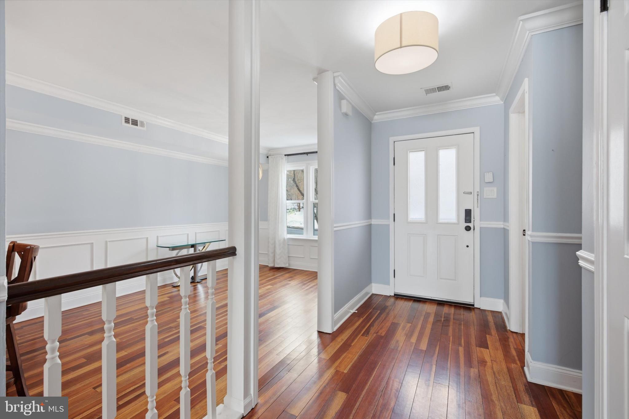 46 Main Street Chesterbrook, PA 19087 - Photo 4 of 44 a view of a hallway with wooden floor and staircase