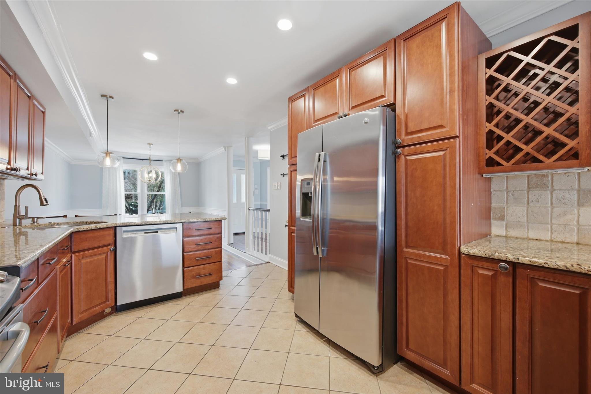 46 Main Street Chesterbrook, PA 19087 - Photo 10 of 44 a large kitchen with stainless steel appliances granite countertop a refrigerator and a sink