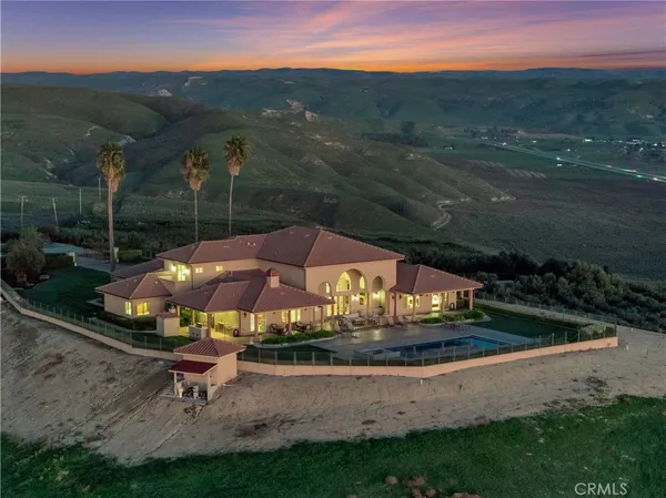 a view of a house with swimming pool