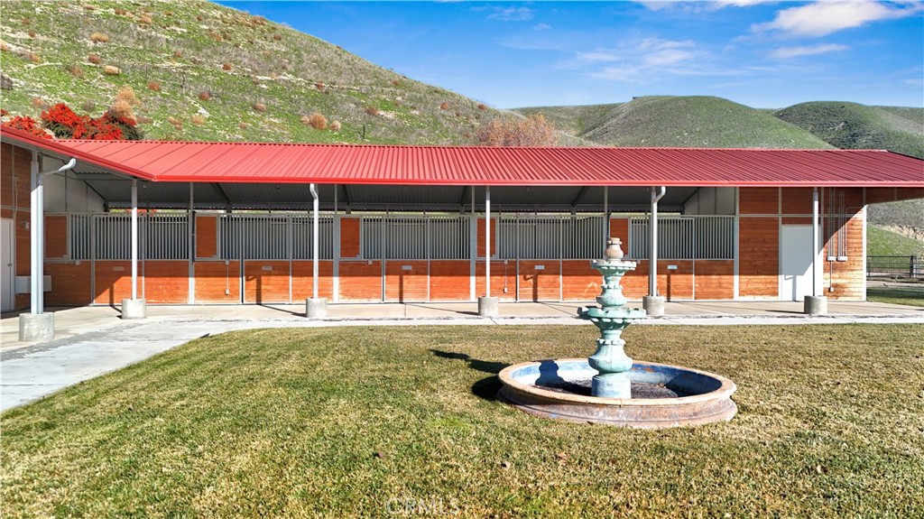 1990 East 46th Shandon, CA 93461 - Photo 60 of 70 a view of a house with a swimming pool and a yard