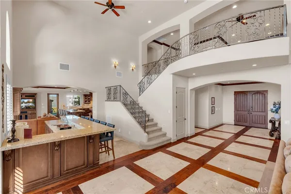 a kitchen with furniture and a stove