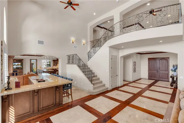 a kitchen with furniture and a stove