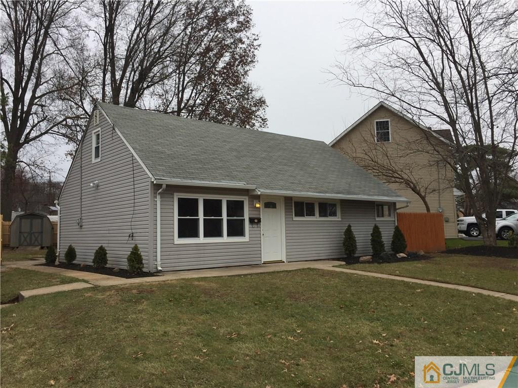 40 Parkerson Road Edison, NJ 08817 - Photo 1 of 11 a house with trees in the background