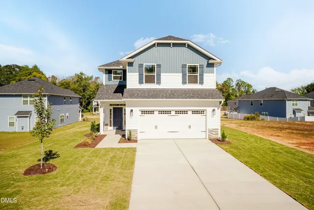 a front view of a house with swimming pool