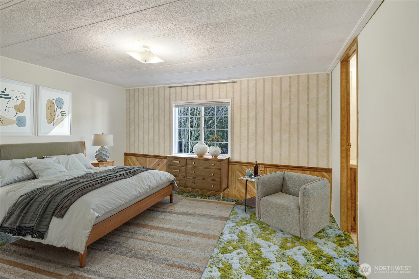 4806 Cushman Road Northeast, Unit 139 Olympia, WA 98506 - Photo 12 of 22 a bedroom with a bed couch and a window