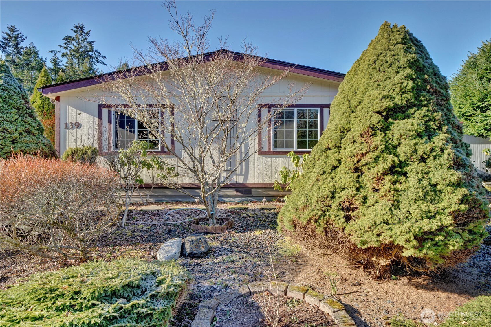 4806 Cushman Road Northeast, Unit 139 Olympia, WA 98506 - Photo 20 of 22 a view of a house with a yard