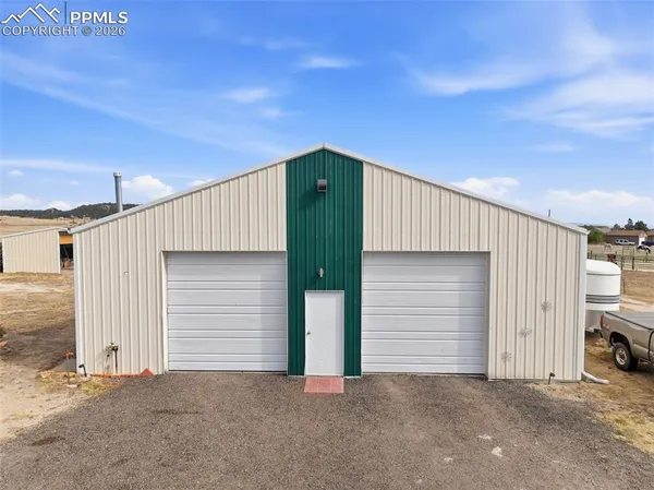 a view of a house with garage