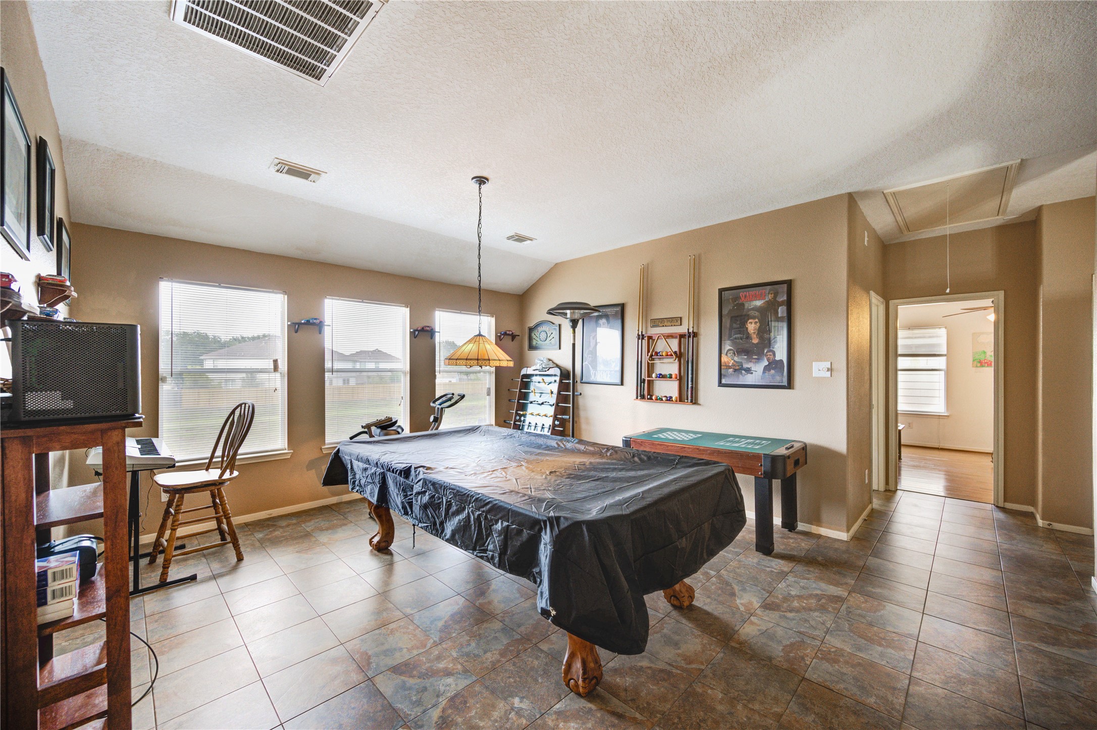 16730 Spring Barker Drive Cypress, TX 77429 - Photo 41 of 50 a living room with a table and chairs