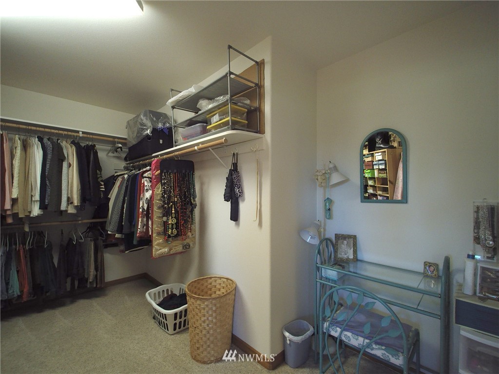 247 Jake Way Sequim, WA 98382 - Photo 27 of 40 a view of walk in closet with clothes and shoes