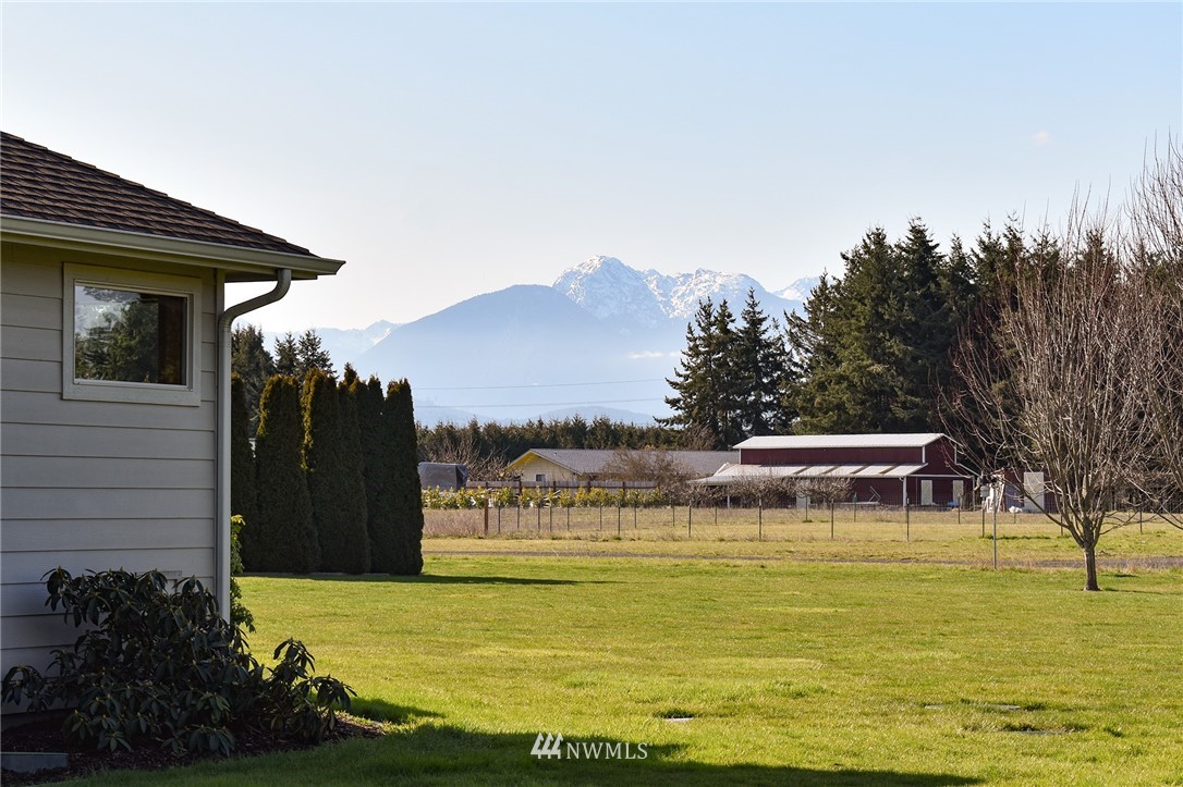 247 Jake Way Sequim, WA 98382 - Photo 39 of 40 a view of a swimming pool with an ocean view