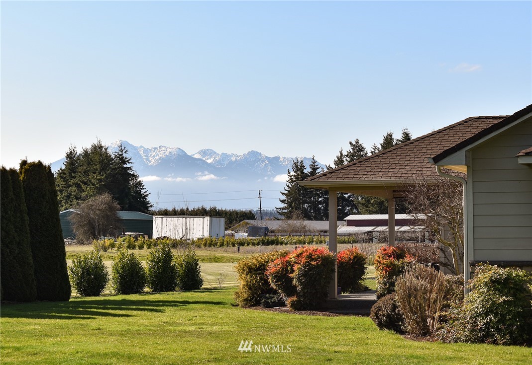 247 Jake Way Sequim, WA 98382 - Photo 40 of 40 a view of a house with a yard