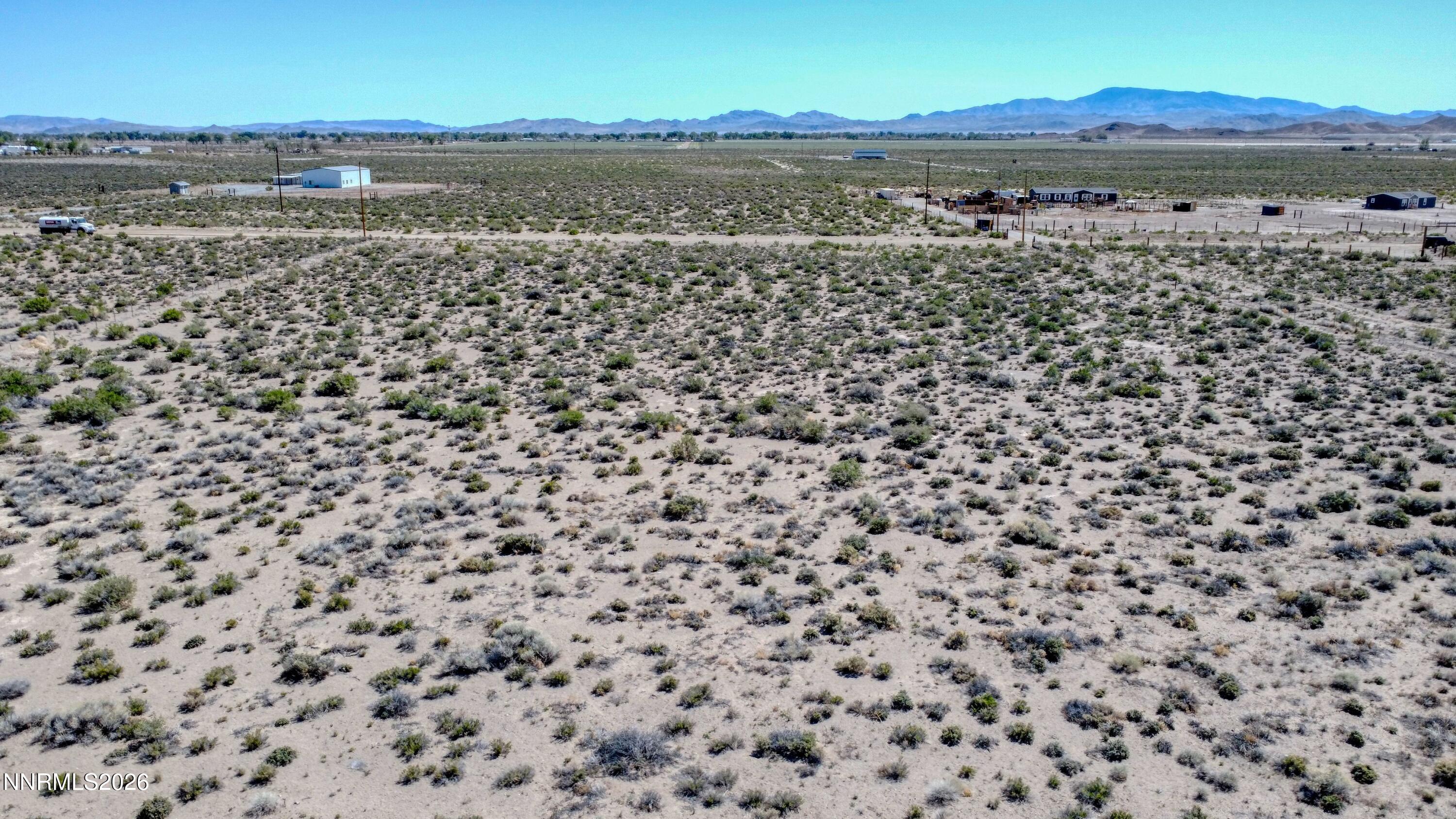 59 Mason Pass Road Yerington, NV 89447 - Photo 3 of 4 a view of a lake with a mountain