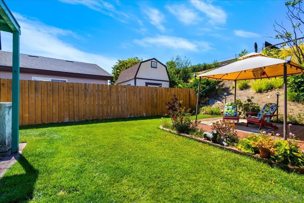 10738 2nd Street Santee, CA 92071 - Photo 36 of 52 a view of backyard with outdoor seating and green space
