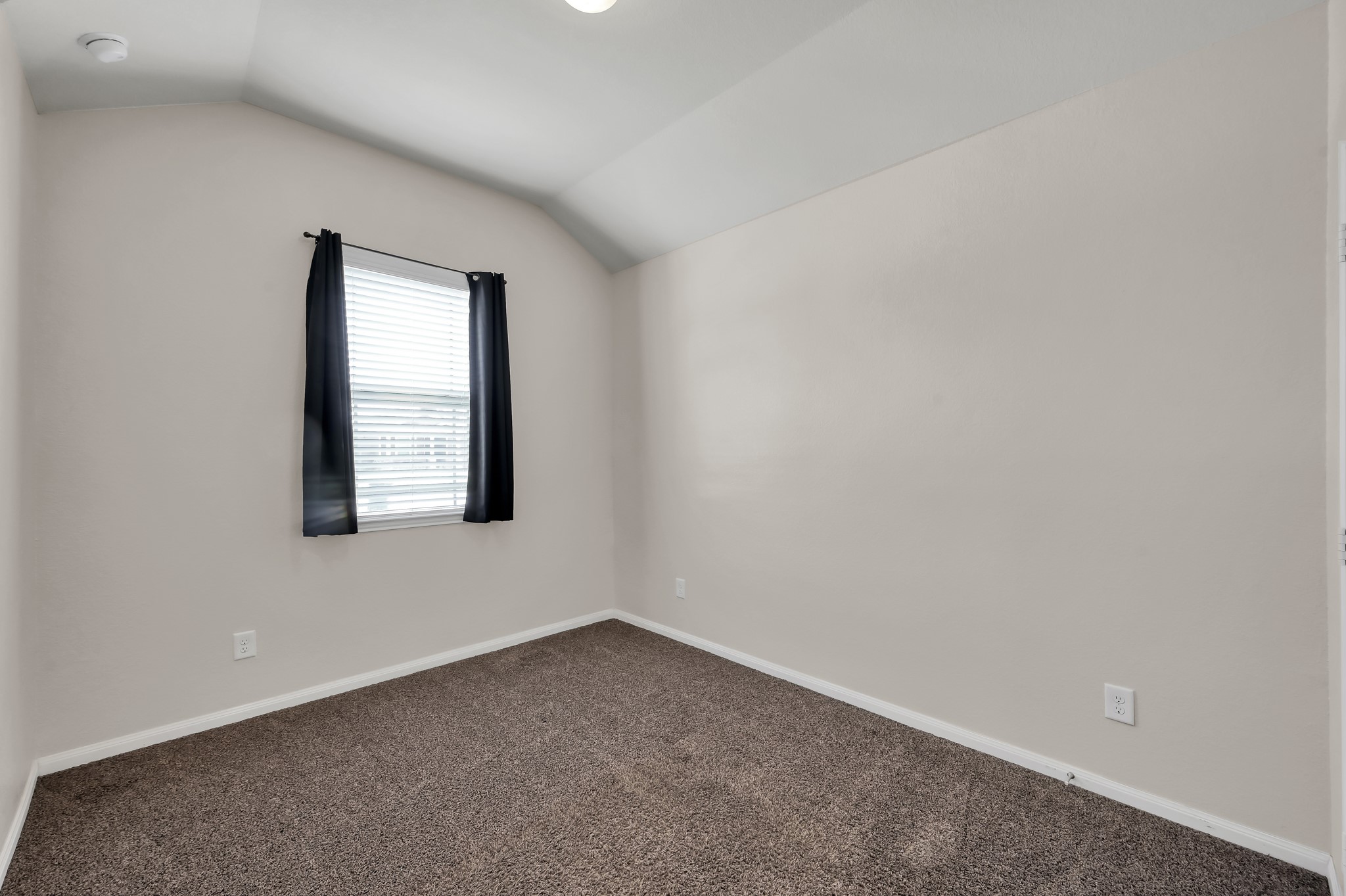 3532 Korina Way Conroe, TX 77306 - Photo 27 of 34 an empty room with a window