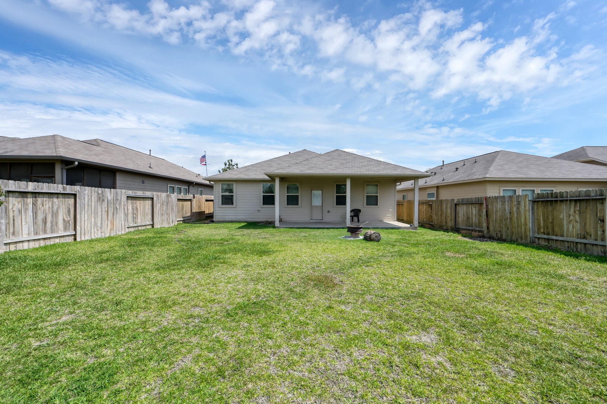 3532 Korina Way Conroe, TX 77306 - Photo 32 of 34 a view of a barn with big yard plants and large trees