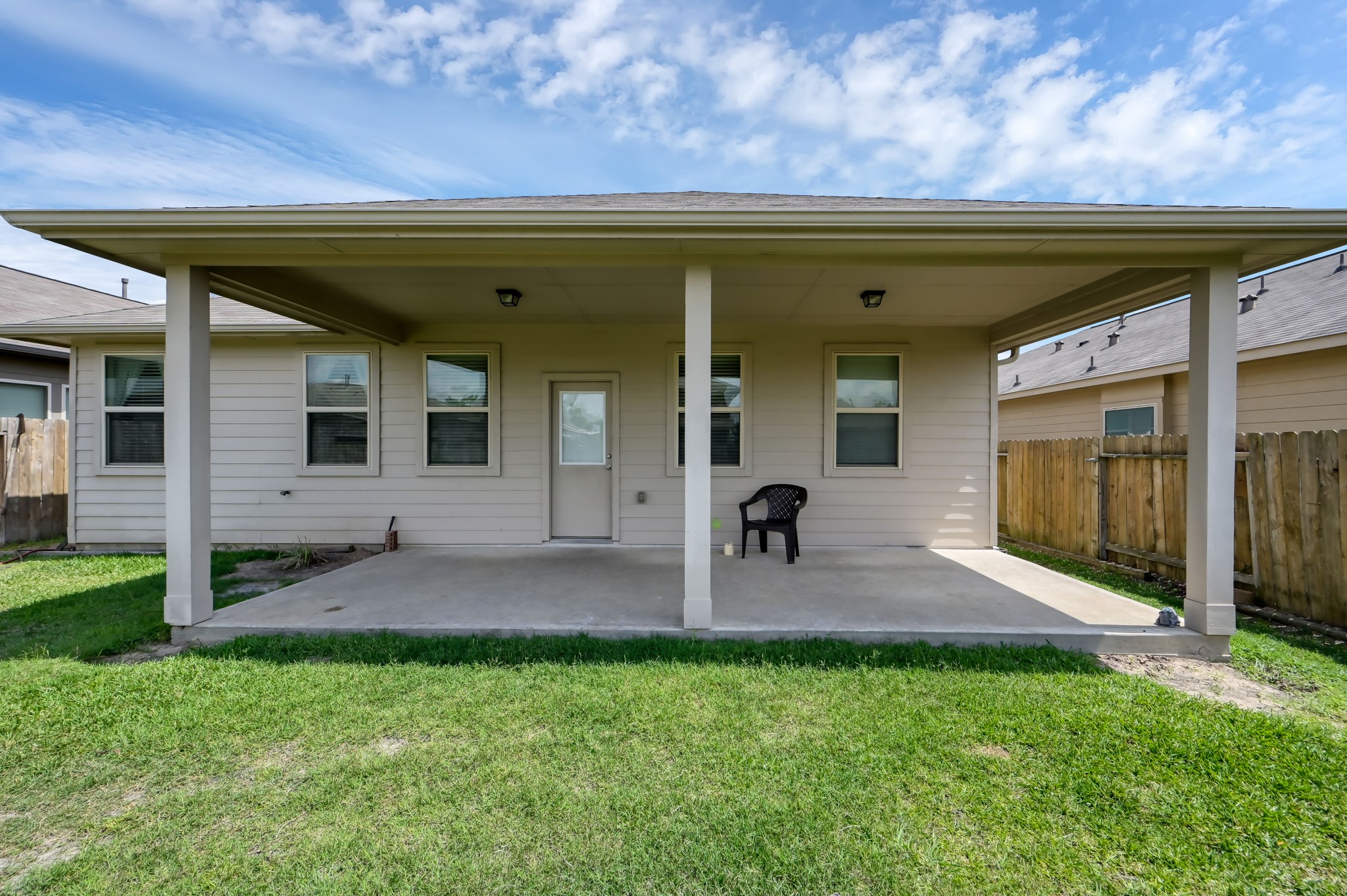 3532 Korina Way Conroe, TX 77306 - Photo 34 of 34 a front view of a house with garden