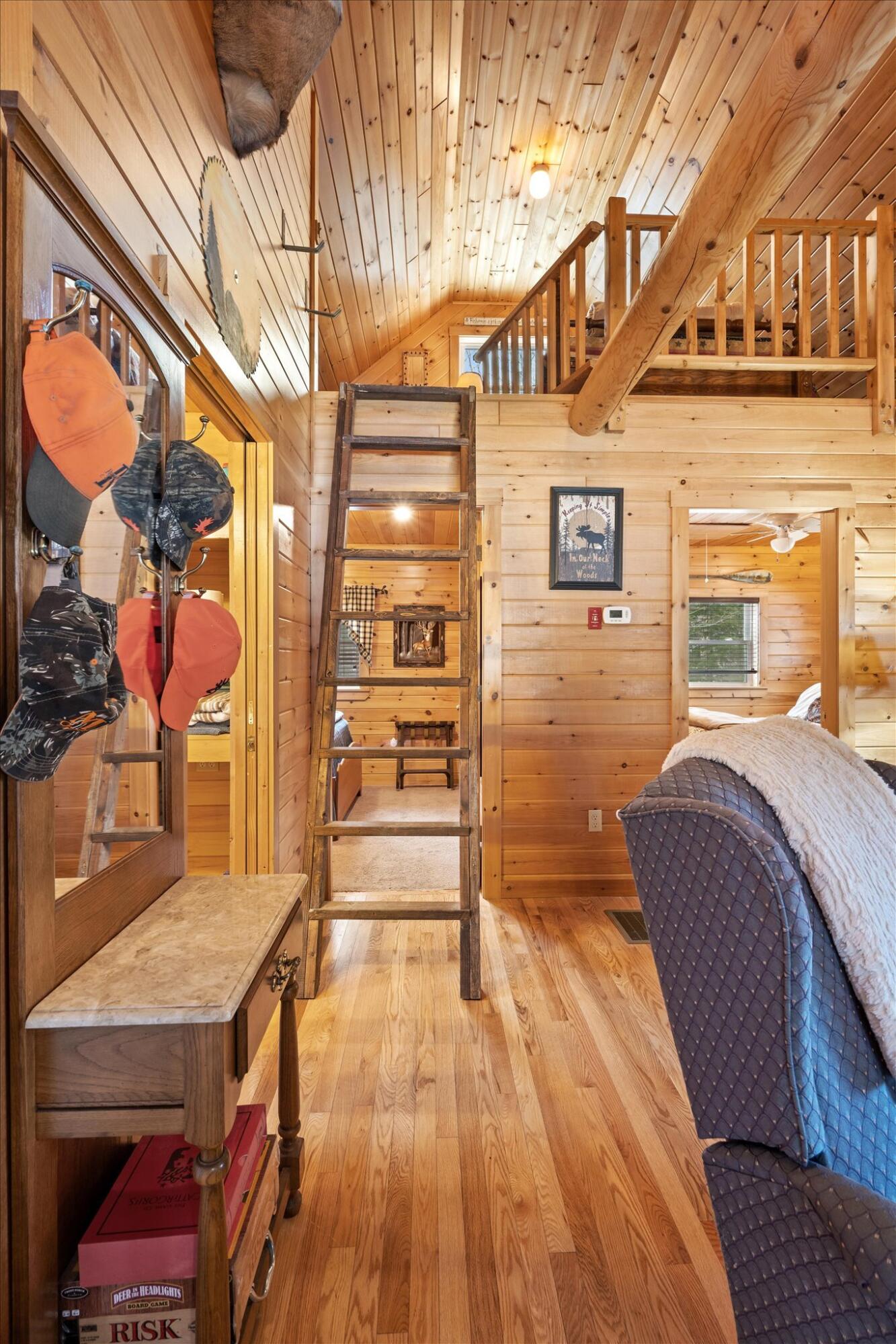 25 Wisdom Road Island Falls, ME 04747 - Photo 26 of 49 24-Loft Stairs