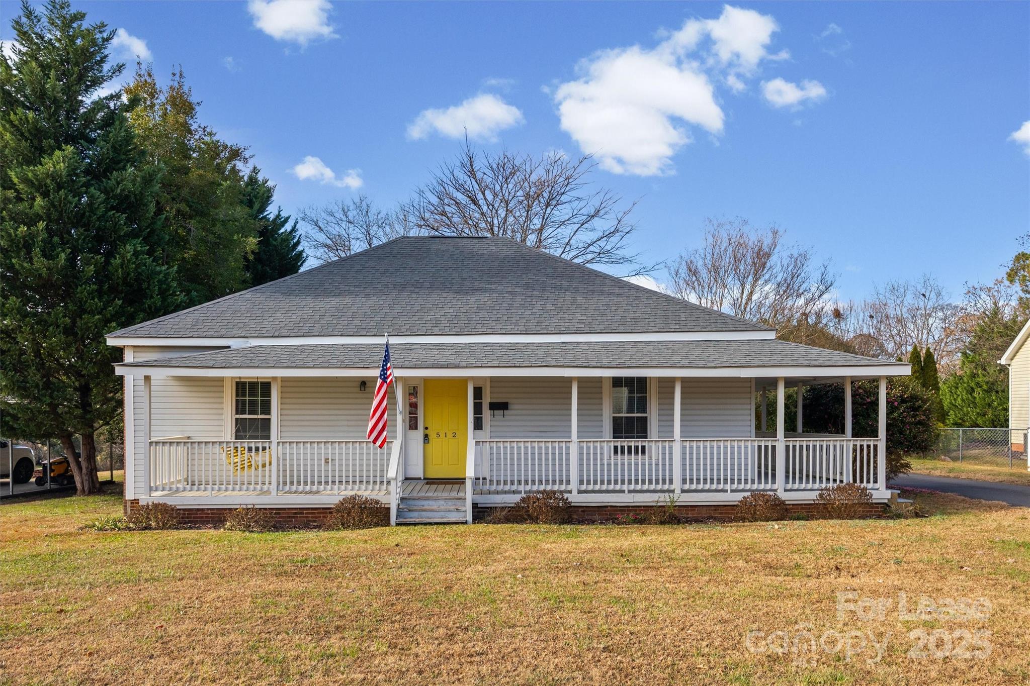 512 Banks Street Fort Mill, SC 29715 - Photo 1 of 30 a backyard of a house with yard fire pit barbeque oven and outdoor seating