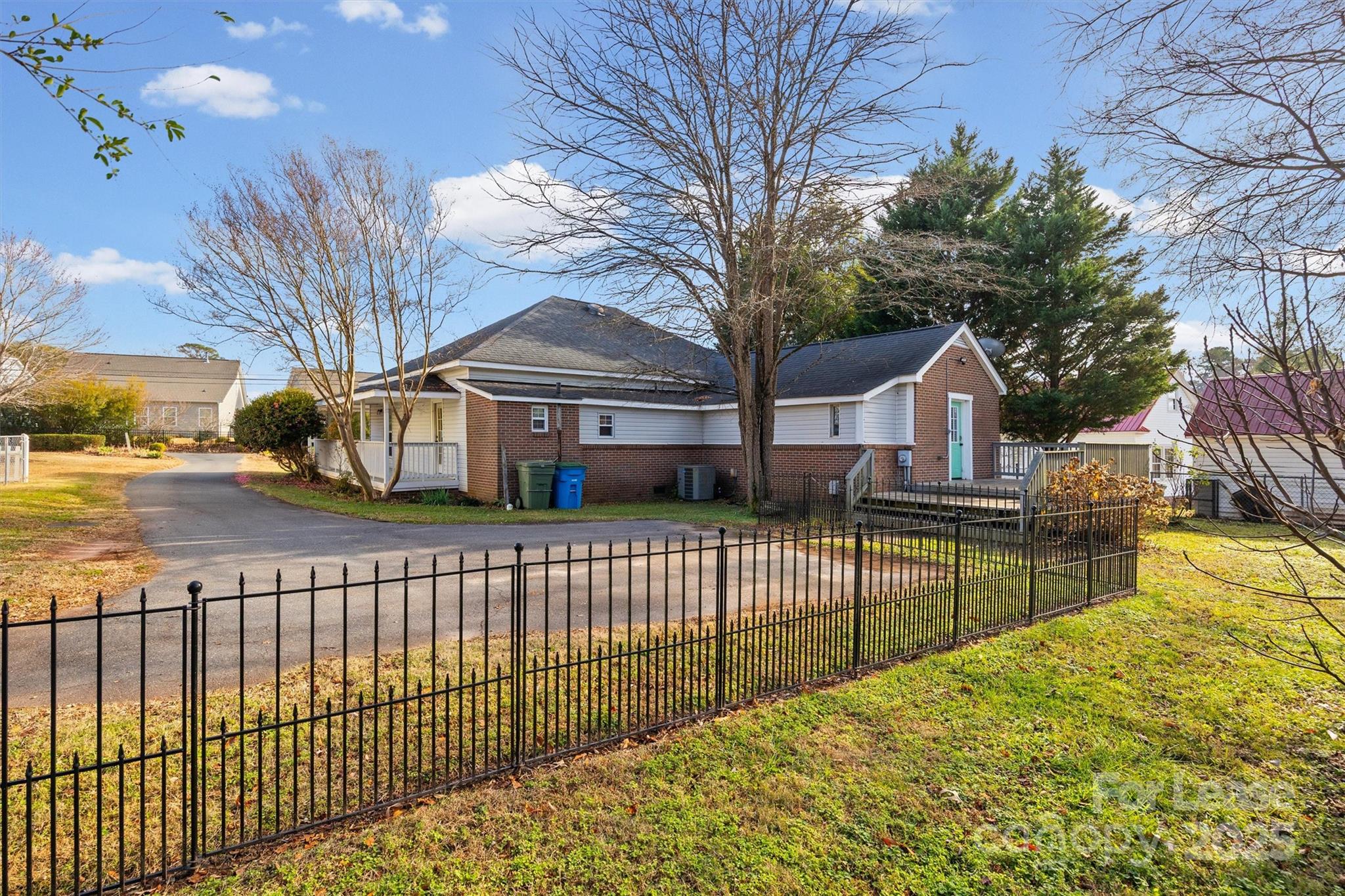 512 Banks Street Fort Mill, SC 29715 - Photo 28 of 30 a view of a house with wooden fence