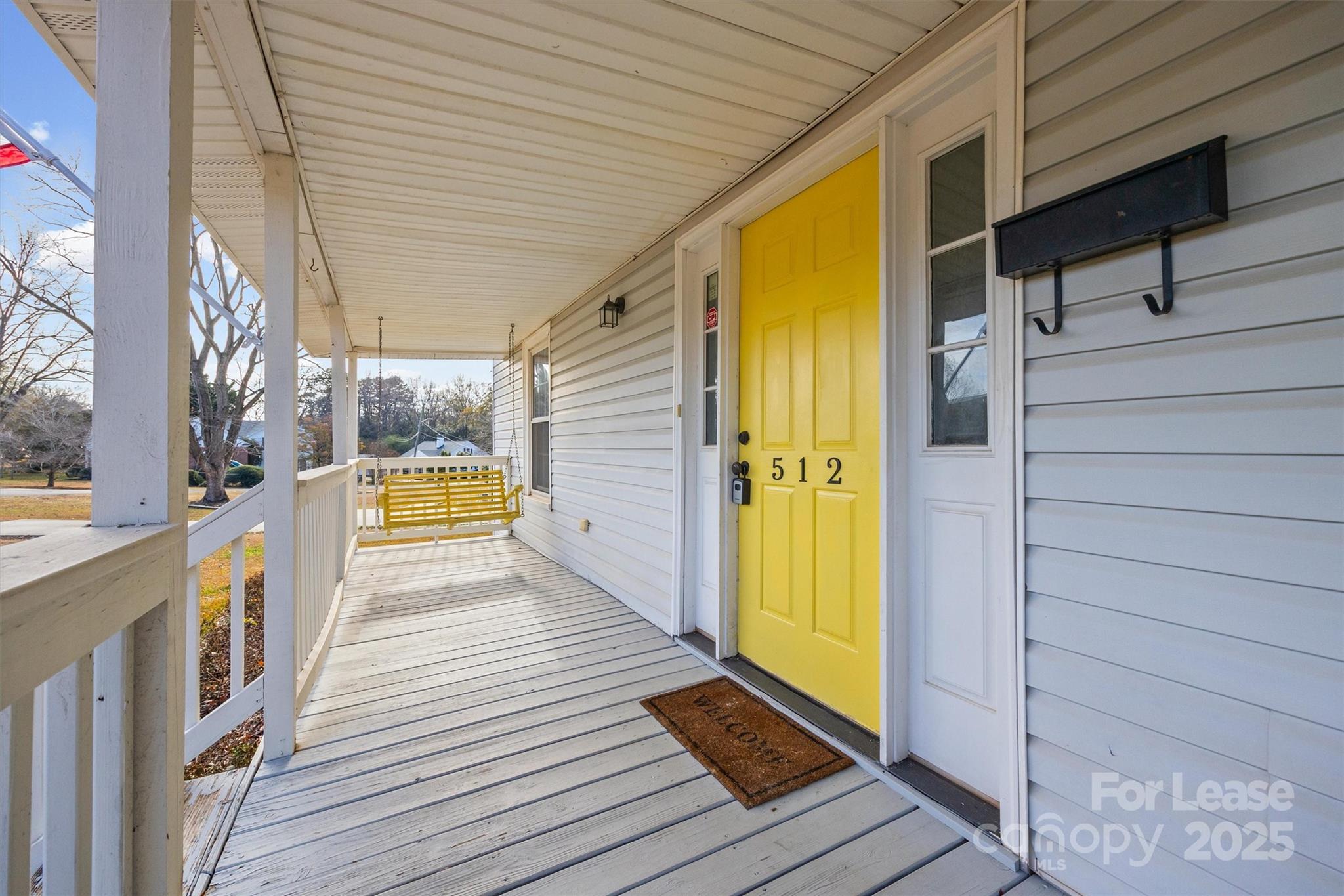 512 Banks Street Fort Mill, SC 29715 - Photo 3 of 30 a view of a balcony with wooden floor