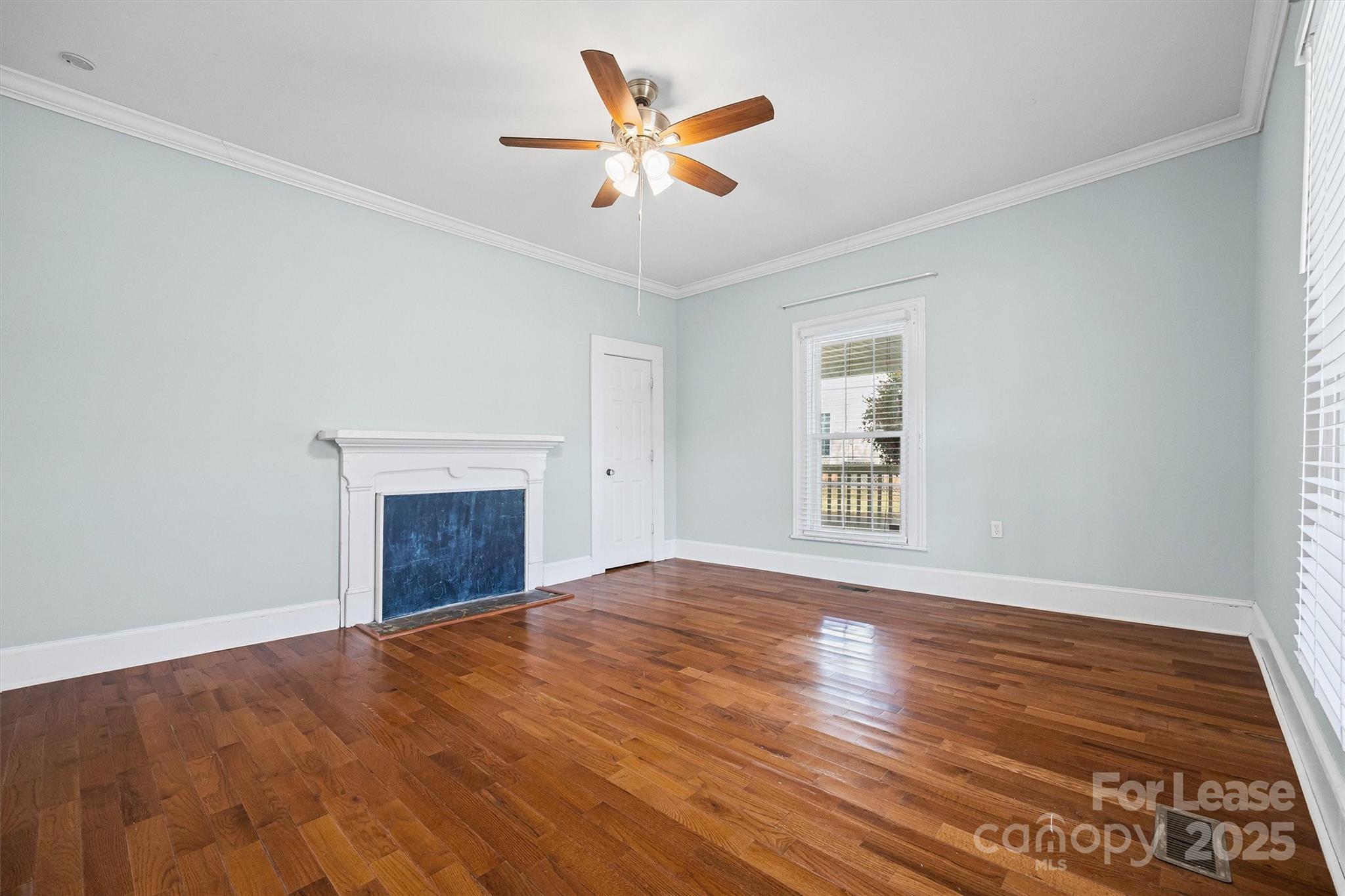 512 Banks Street Fort Mill, SC 29715 - Photo 8 of 30 wooden floor in an empty room with a window