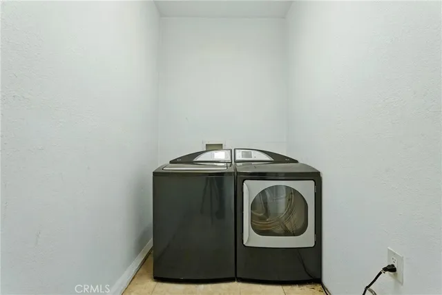 a view of a pathway with a house in the background