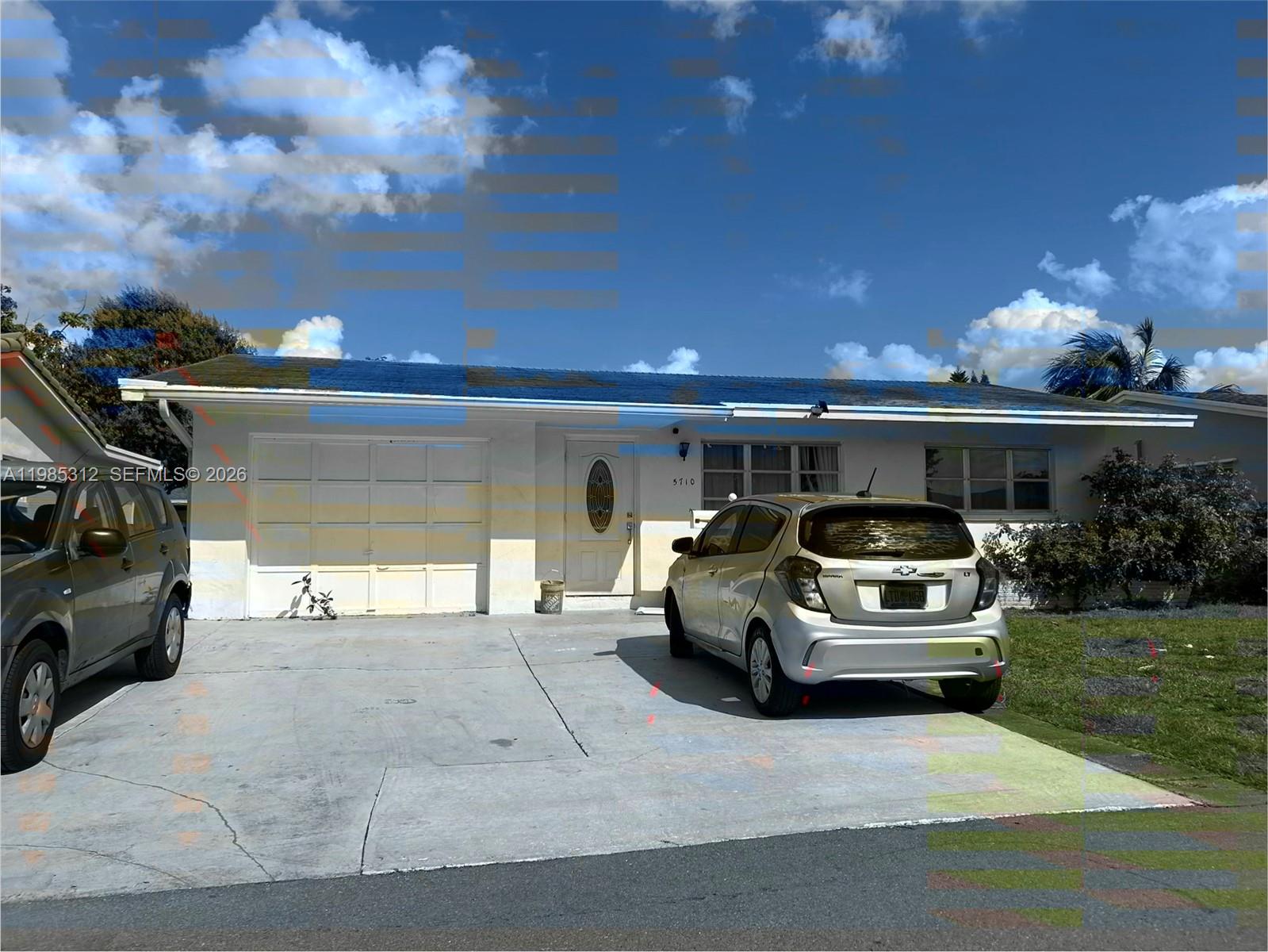 a car parked in parking and a garage