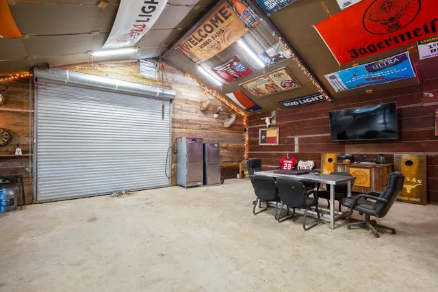 a big room with potted plants