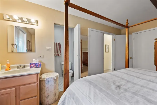 a view of a livingroom with furniture and staircase