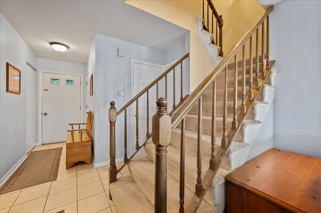 a view of a hallway with seating area