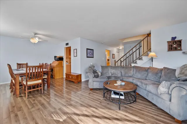 a bedroom with a bed and a flat tv screen on the dresser