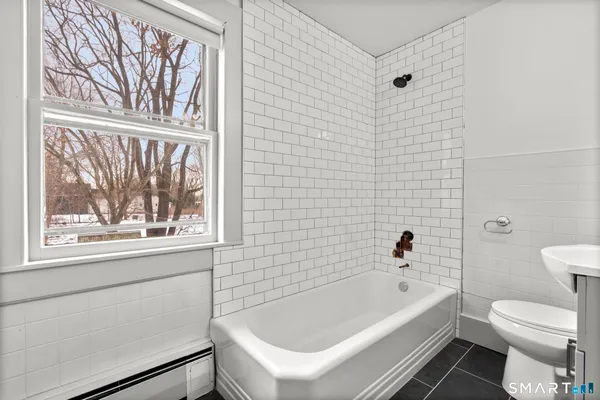 a bathroom with a sink and a bathtub