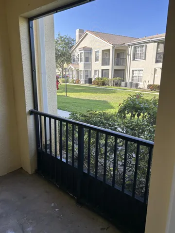 a view of a porch with a garden