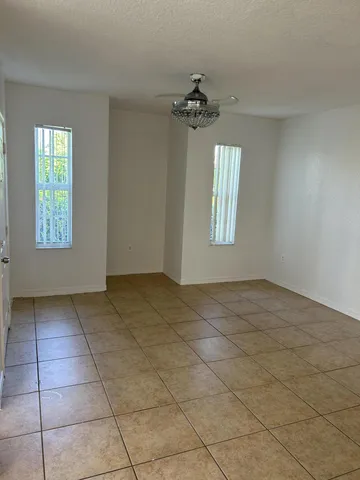 a view of an empty room and window