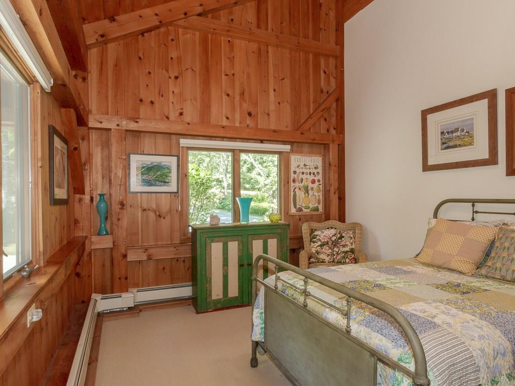 506 Newbury Neck Road Surry, ME 04684 - Photo 21 of 35 A third and fourth bedroom share a...